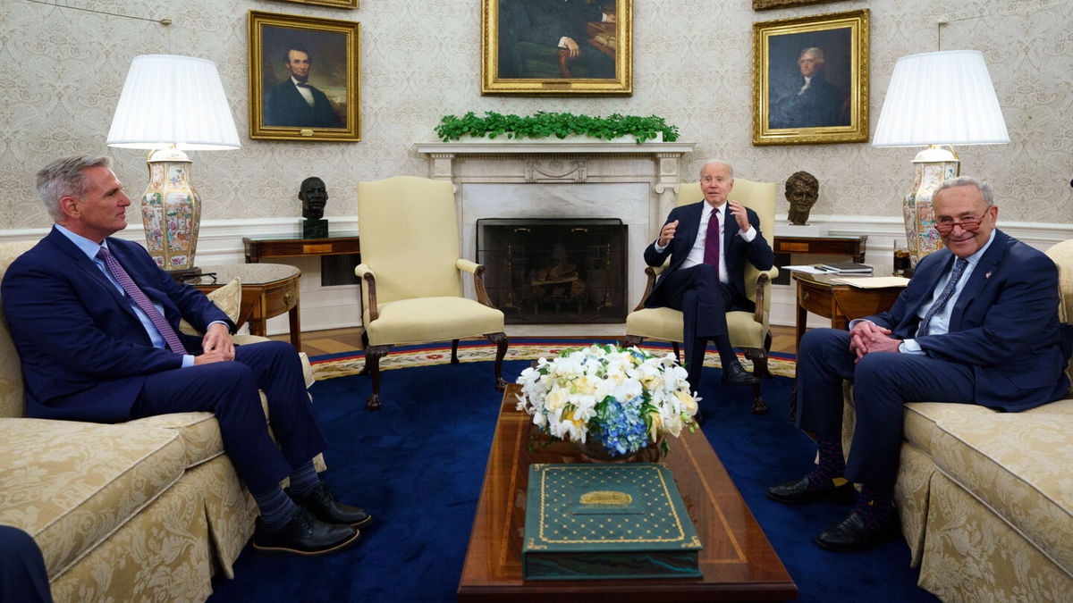 <i>Evan Vucci/AP</i><br/>House Speaker Kevin McCarthy and Senate Majority Leader Chuck Schumer meet with President Joe Biden to discuss the national debt limit in the Oval Office of the White House on Tuesday in Washington