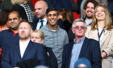 Rishi Sunak is pictured here before the match.