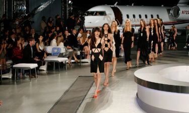 Models walk during Chanel's 2007 Resort runway show in Santa Monica