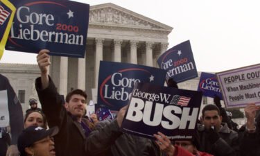 Bush and Gore supporters are pictured here arguing their point to each other in front of the U.S. Supreme Court building in December 2000 in Washington