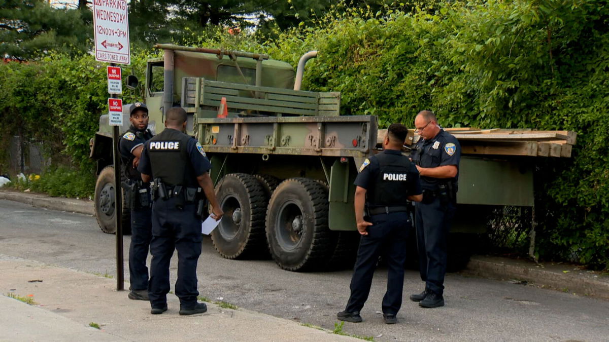 <i>WBAL</i><br/>Police surround a privately-owned military vehicle in Baltimore after a suspect was taken into custody for allegedly stealing the 5-ton vehicle and leading officers on a highway chase.