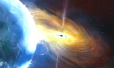 This illustration depicts a growing black hole as it gobbles up gas