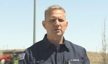 Aurora Fire Chief Alec Oughton addresses reporters at a news conference outside the Gaylord Rockies Resort after an HVAC collapse injured six people on Saturday