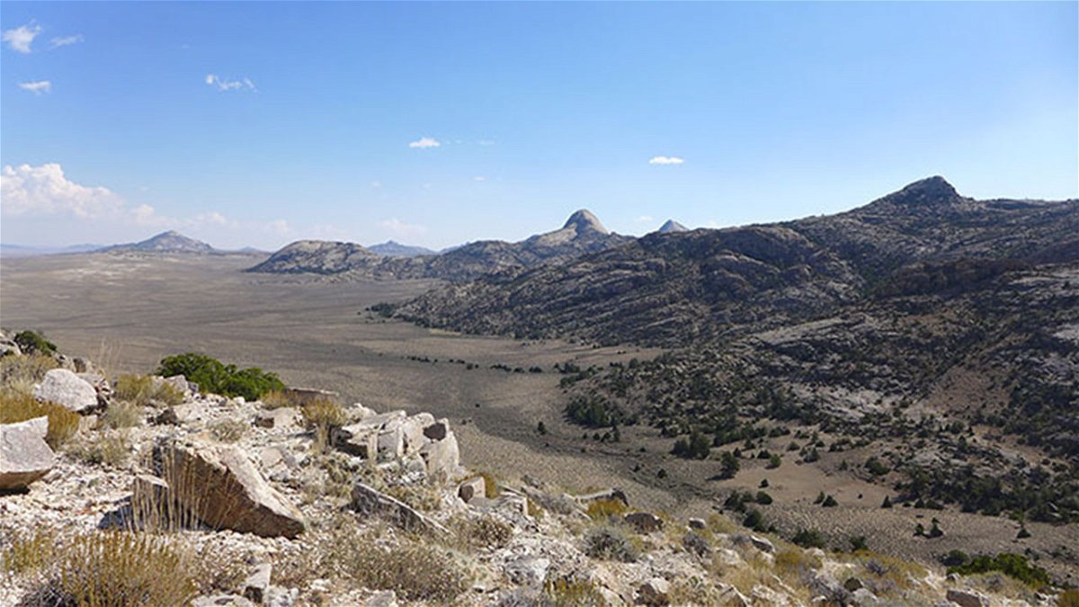 Granite Mountains in central Wyoming. Lone Mountain is at the far left, Lankin Dome is right of center, and Moonstone Peak is immediately to the right of Lankin Dome.