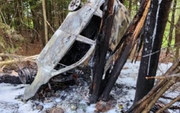 Dispatchers learned that the car involved in the crash had rolled over at least once before landing upside down against a tree and bursting into flames.