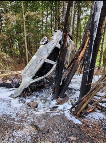 <i>Oxford County Sheriff's Department</i><br/>Dispatchers learned that the car involved in the crash had rolled over at least once before landing upside down against a tree and bursting into flames.