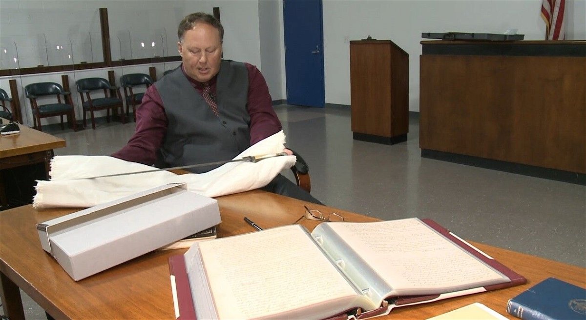 <i>WTKR</i><br/>Rick Francis is the Clerk of Court in Southampton County. He also is a descendant of the family that owned Nat Turner. He is keeper of the history of both his family and the county. He is holding Nat Turner's sword which is kept by the Historical Society.