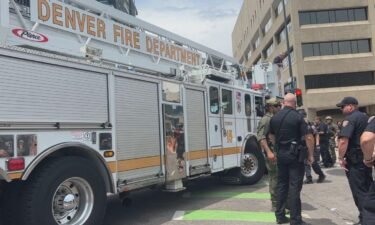 Veteran SWAT police officer Sgt. Justin Dodge was at Denver Health late Thursday for a serious leg injury after getting trapped under the wheel of a Denver fire truck during the Denver Nuggets parade earlier in the day.