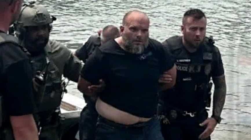 <i>Louisville Metro Police Department/WLKY</i><br/>Louisville police arrested a wanted suspect on Thursday after a chase that they say ended in the Ohio River. Louisville Metro Police Department arrested Timothy Edison