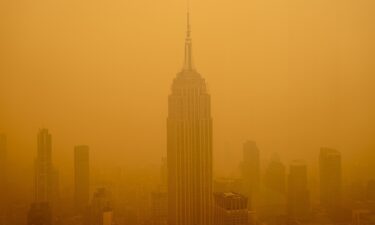 Smoky haze from wildfires in Canada diminishes the visibility of the Empire State Building on June 7 in New York City.