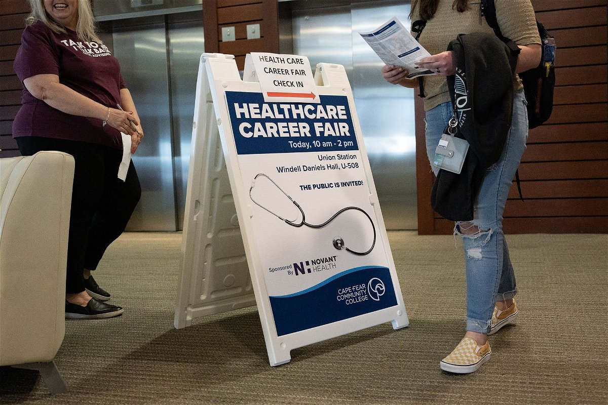 <i>Allison Joyce/Bloomberg/Getty Images</i><br/>A sign for a healthcare career fair at Cape Fear Community College in Wilmington