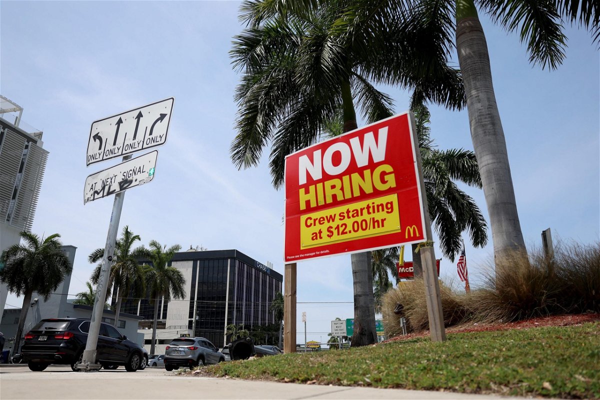 <i>Joe Raedle/Getty Images</i><br/>A 'Now Hiring' sign posted outside of a restaurant looking to hire workers on May 05
