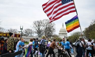 Supporters of LGBTQA+ rights march from Union Station towards Capitol Hill in Washington