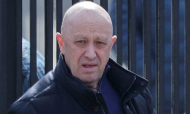 Founder of Wagner private mercenary group Yevgeny Prigozhin leaves a cemetery before the funeral of a Russian military blogger who was killed in a bomb attack in a St Petersburg cafe