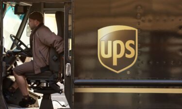 A United Parcel Service (UPS) driver sits in his delivery truck on January 31 in San Francisco
