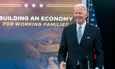 President Joe Biden arrives for a meeting with business and labor leaders in November 2022 at the White House in Washington. Biden is attempting to usher in the era of “Bidenomics.”