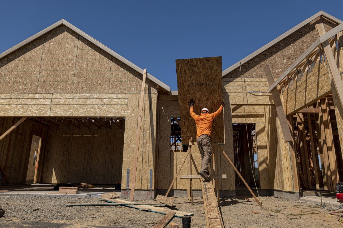 <i>David Paul Morris/Bloomberg/Getty Images</i><br/>US home building surged in May. A contractor works on a house under construction in Folsom