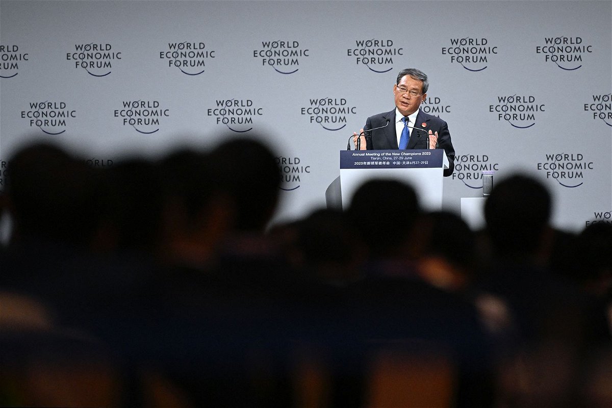 <i>Wang Zhao/AFP/Getty Images</i><br/>Chinese Premier Li Qiang delivers his speech on the opening ceremony of the World Economic Forum (WEF) in Tianjin on June 27