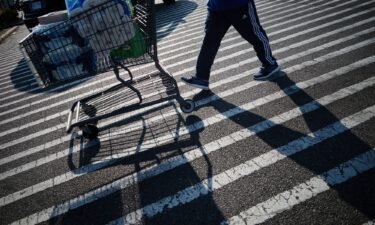 A shopper pushes a cart outside a BJ's Wholesale Club location in New York