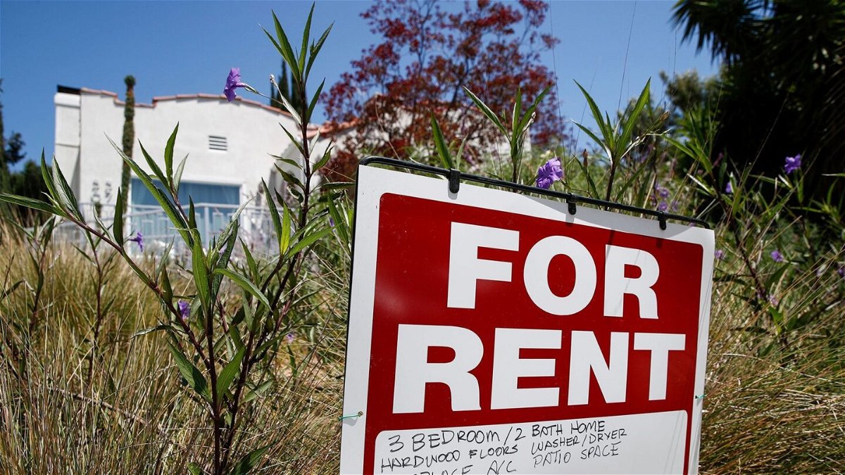 <i>Caroline Brehman/EPA-EFE/Shutterstock</i><br/>Rent is falling in America for the first time in years. A 'for rent' sign is posted in a front yard in Los Angeles