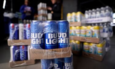 Bud Light’s parent company Anheuser-Busch is writing checks to beer distributors affected by two months of plunging sales sparked by an ongoing customer boycott.