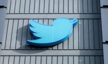 The Twitter logo is seen on a sign on the exterior of Twitter headquarters in San Francisco