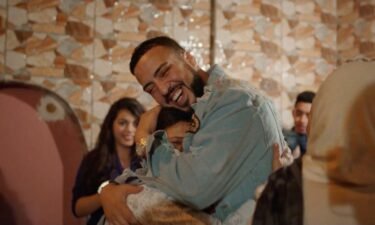 French Montana hugs his mother