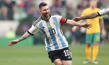 Lionel Messi celebrates after scoring against Australia.