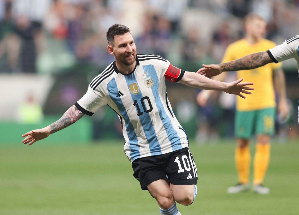 <i>Jia Haocheng/Xinhua/Alamy Live News/AP</i><br/>Lionel Messi celebrates after scoring against Australia.