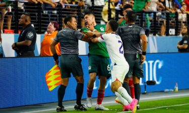 USA defender Sergino Dest shoves Mexico defender Gerardo Arteaga (6) during the second half at Allegiant Stadium.