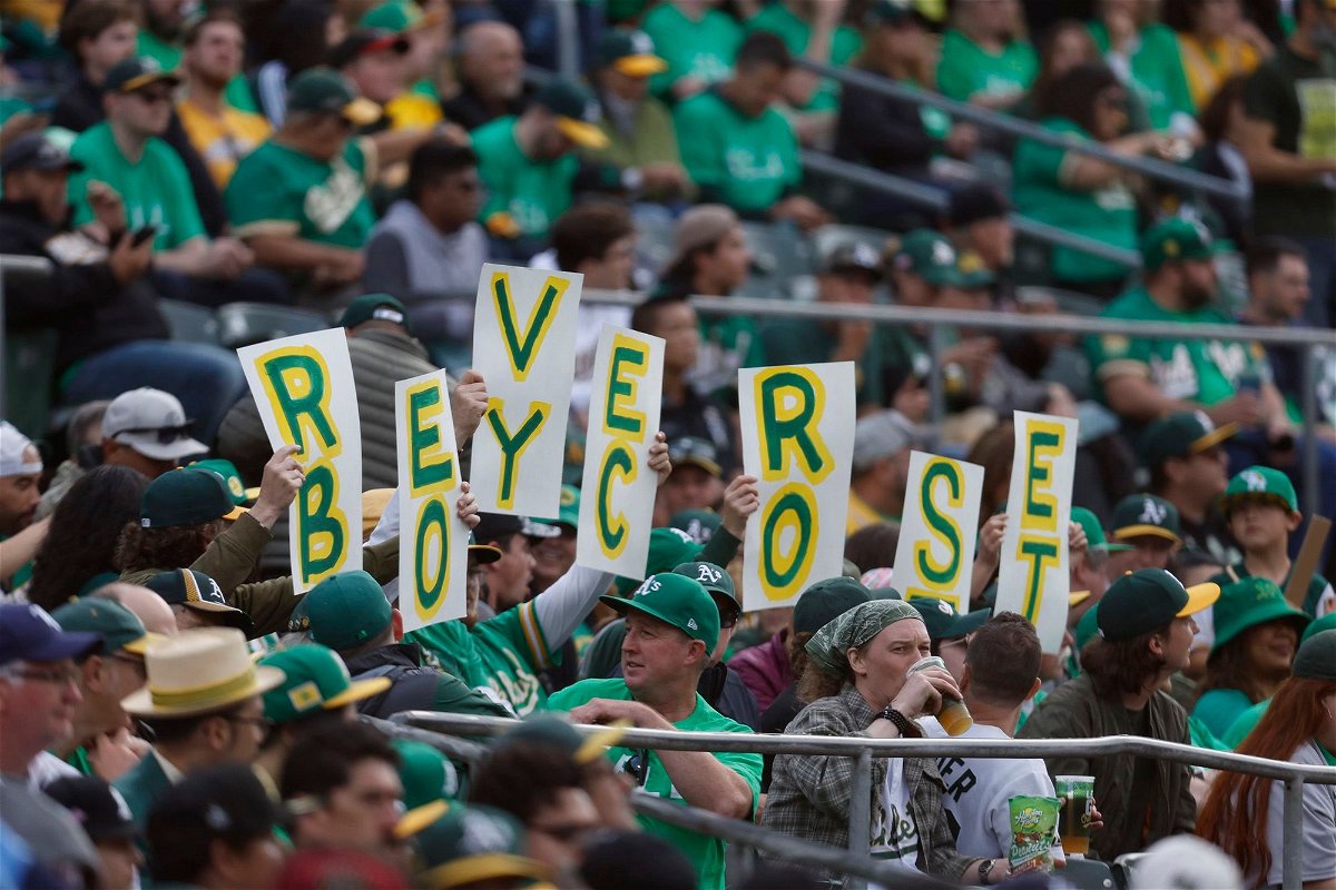 <i>Jed Jacobsohn/AP</i><br/>Fans hold signs inside the Oakland Coliseum to protest the Oakland Athletics' planned move to Las Vegas.
