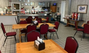 Staffers make last-minute preparations behind the buffet at Carolina Bar-B-Que in New Ellenton