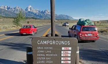 Signs show full campgrounds in Grand Teton National Park on August 19