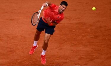 Novak Djokovic of Serbia serves against Casper Ruud of Norway during the Men's Singles Final match on Day Fifteen of the 2023 French Open at Roland Garros on June 11 in Paris