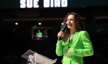 Sue Bird gives a speech during her jersey retirement ceremony on June 11