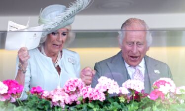 King Charles II and Queen Camilla watch their horse