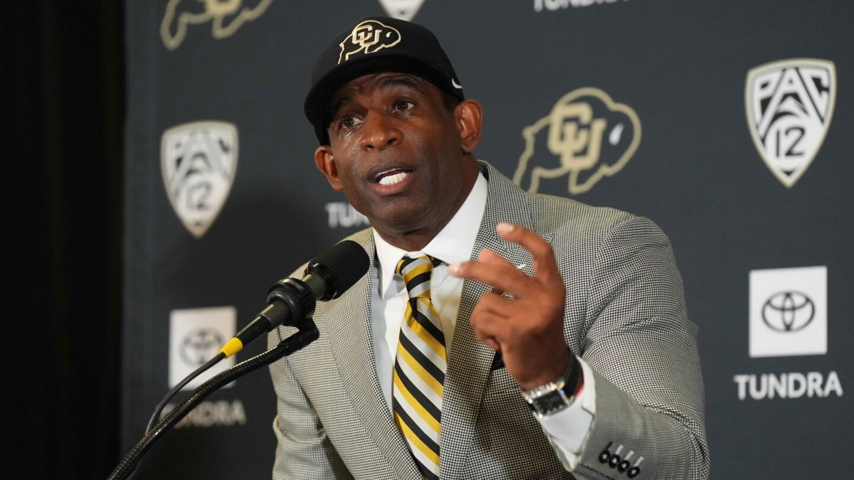 <i>Ron Chenoy/USA Today Sports/Reuters</i><br/>Colorado Buffaloes head coach Deion Sanders speaks during a press conference in December 2022.