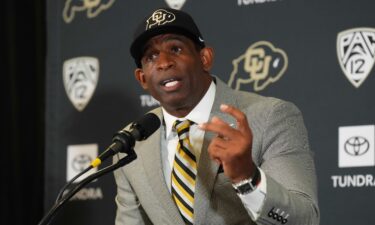 Colorado Buffaloes head coach Deion Sanders speaks during a press conference in December 2022.