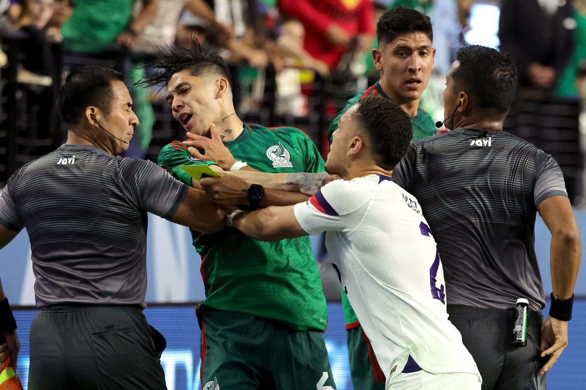 <i>Ethan Miller/USSF/Getty Images</i><br/>Gerardo Arteaga (center left) and Sergiño Dest (center right) scuffle during the Concacaf Nations League semifinal between the US and Mexico.