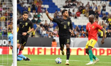 Brazil's forward Rodrygo (C) celebrates after scoring his team's second goal.