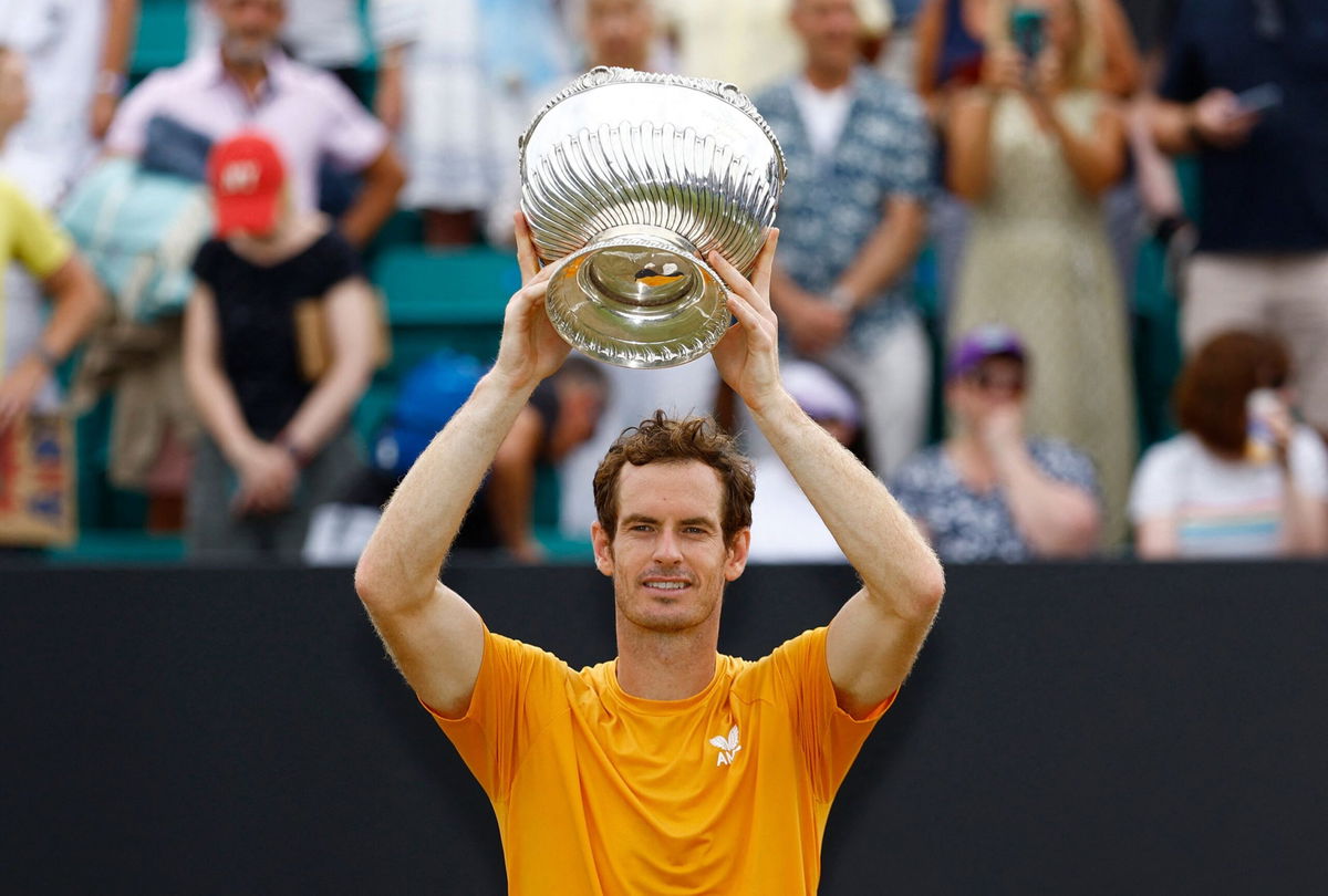 <i>Andrew Boyers/Reuters</i><br/>Andy Murray celebrates with the trophy after winning the Nottingham Open.