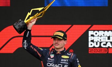 Verstappen celebrates on the podium after winning the Canadian Grand Prix.