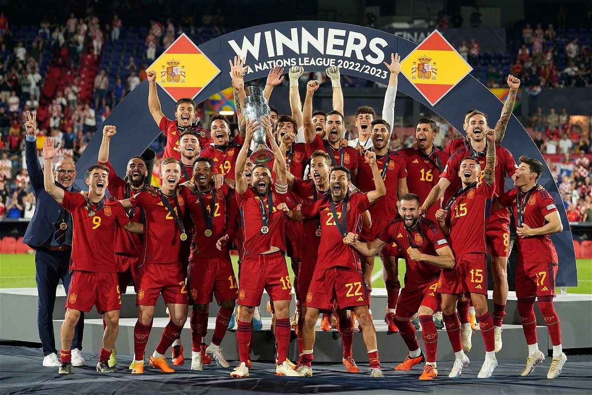 <i>Martin Meissner/AP</i><br/>Spain lifts its first international trophy for 11 years after beating Croatia.