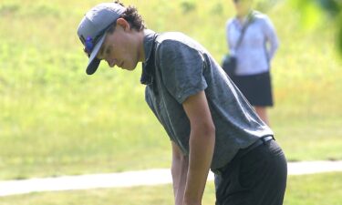 Bloomington South's Happy Gilmore putts on the 1st green at Country Oaks Golf Course during the IHSAA regional golf meet on June 8.