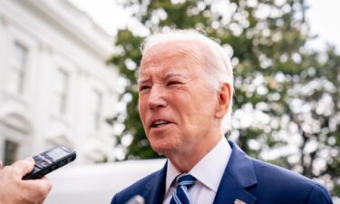 President Joe Biden speaks with members of the media before boarding Marine One on the South Lawn of the White House in Washington on Wednesday