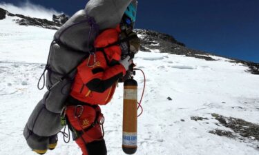 Ngima Tashi Sherpa carries a Malaysian climber from the death zone at Mount Everest on May 18.