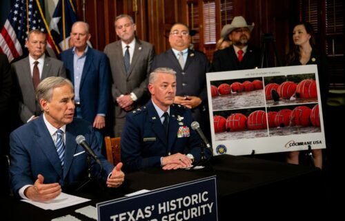 Texas Gov. Greg Abbott speaks about an illustration of new border security implementation during a news conference at the Texas State Capitol on June 8