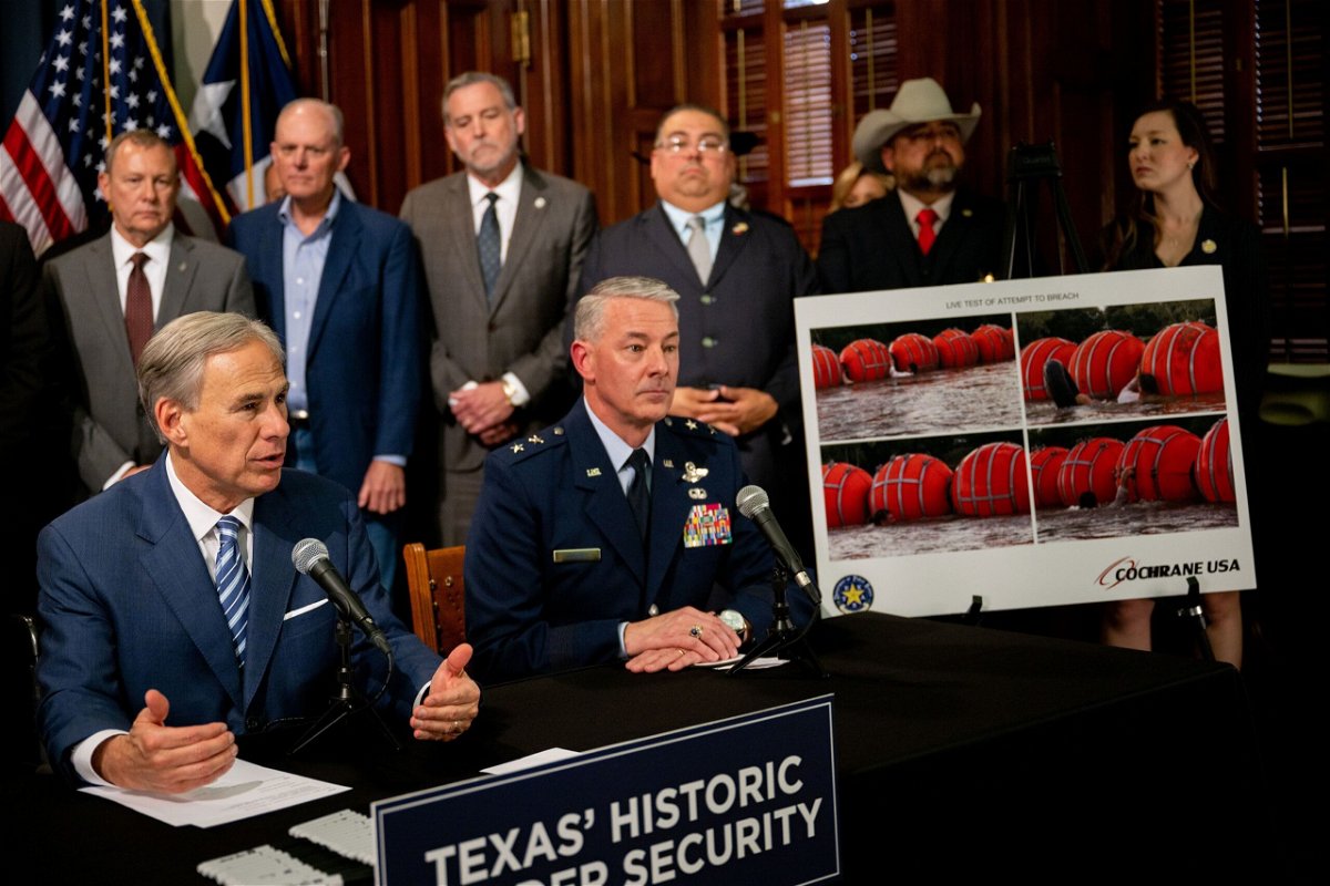 <i>Brandon Bell/Getty Images</i><br/>Texas Gov. Greg Abbott speaks about an illustration of new border security implementation during a news conference at the Texas State Capitol on June 8