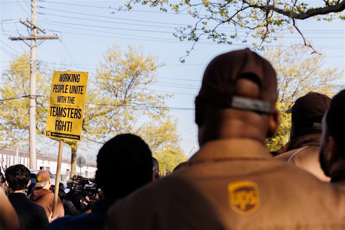 <i>Paul Frangipane/Bloomberg/Getty Images</i><br/>UPS workers and Teamsters members during a rally outside a UPS hub in the Brooklyn borough of New York