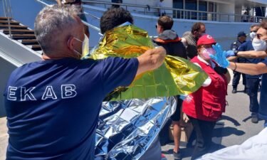 A total of 104 migrants who were traveling on the boat have since been rescued from the water and transferred to the city of Kalamata.